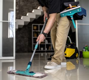 man doing professional home cleaning service
