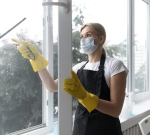 person taking care office cleaning